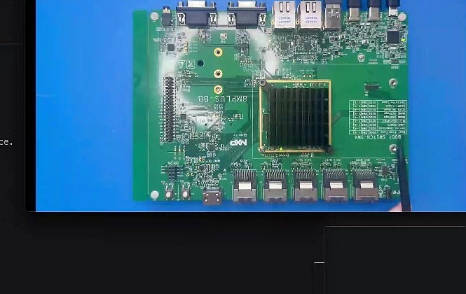 The NXP i.MX 8M Plus doing the inference — a USB webcam in, the NPU running MoveNet, the annotated feed out.
