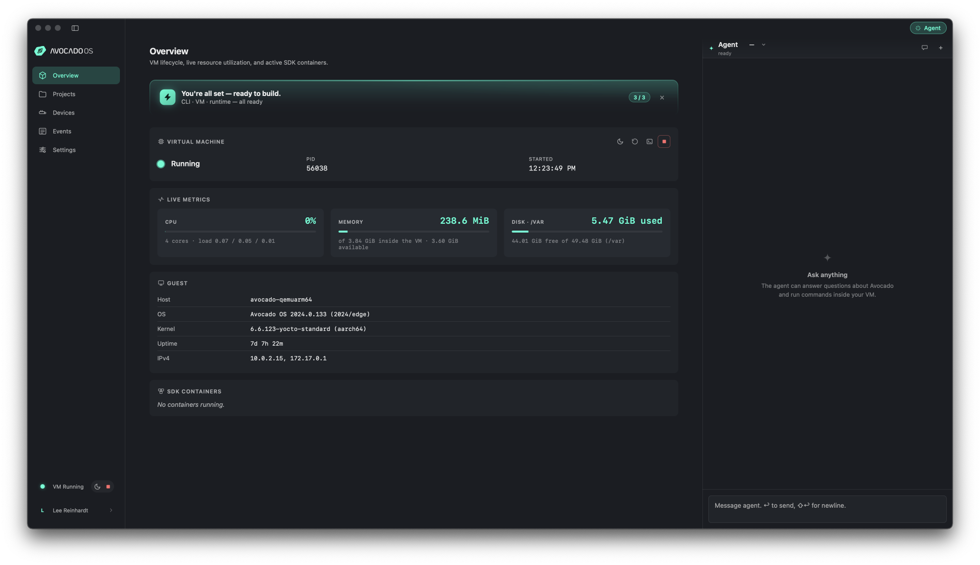 Avocado Desktop, with the build VM and live metrics in the main pane and the agent chat on the right.